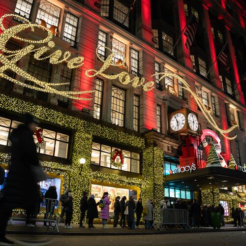 FILE - Shoppers wait in line to enter Macy's flagship store on Nov. 28, 2025 in New York. (AP Photo/Angelina Katsanis, File)