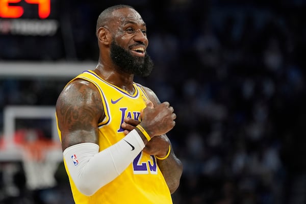 Los Angeles Lakers forward LeBron James reacts during the first half of Game 3 of an NBA basketball first-round playoff series against the Minnesota Timberwolves, Friday, April 25, 2025, in Minneapolis. (AP Photo/Abbie Parr)