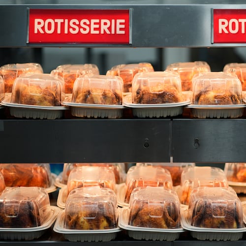 FILE - Rotisserie chickens are on display at a Sam's Club, Sept. 24, 2025, in Bentonville, Ark. (AP Photo/Charlie Riedel, File)