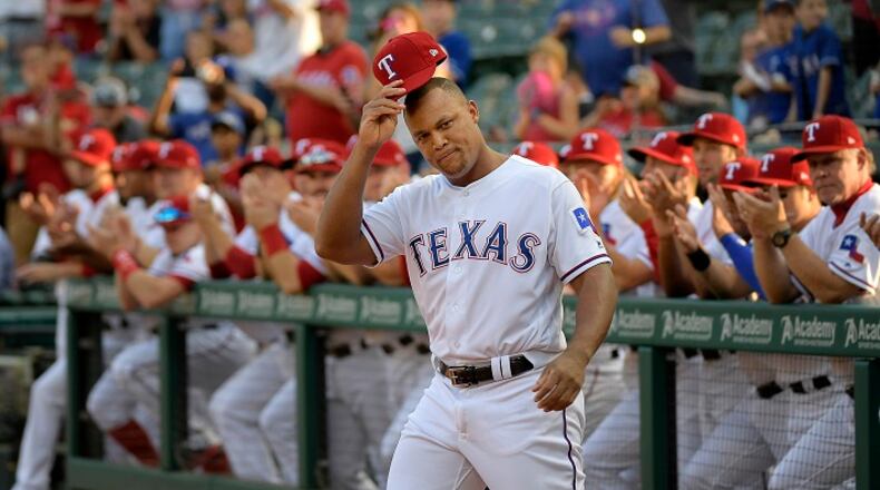 Texas Rangers third baseman Adrian Beltre tips his hat to the fans during the celebration of his reaching the 3,000-hit plateau earlier this season, before a game against the New York Yankees at Globe Life Park in Arlington, Texas, on Friday, Sept. 8, 2017. (Max Faulkner/Fort Worth Star-Telegram/TNS)