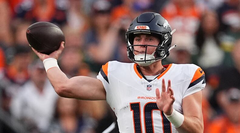 Denver Broncos quarterback Bo Nix (10) throws against the Green Bay Packers during the first half of an NFL preseason football game Friday, Aug. 21, 2026, in Denver. (AP Photo/David Zalubowski)