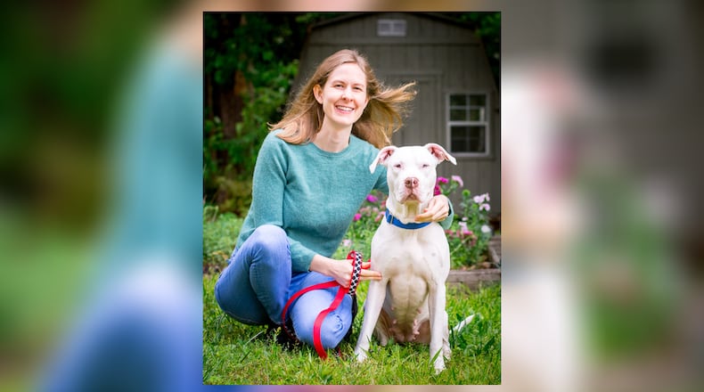 A metro Atlanta resident with a foster pet from LifeLine Animal Project.