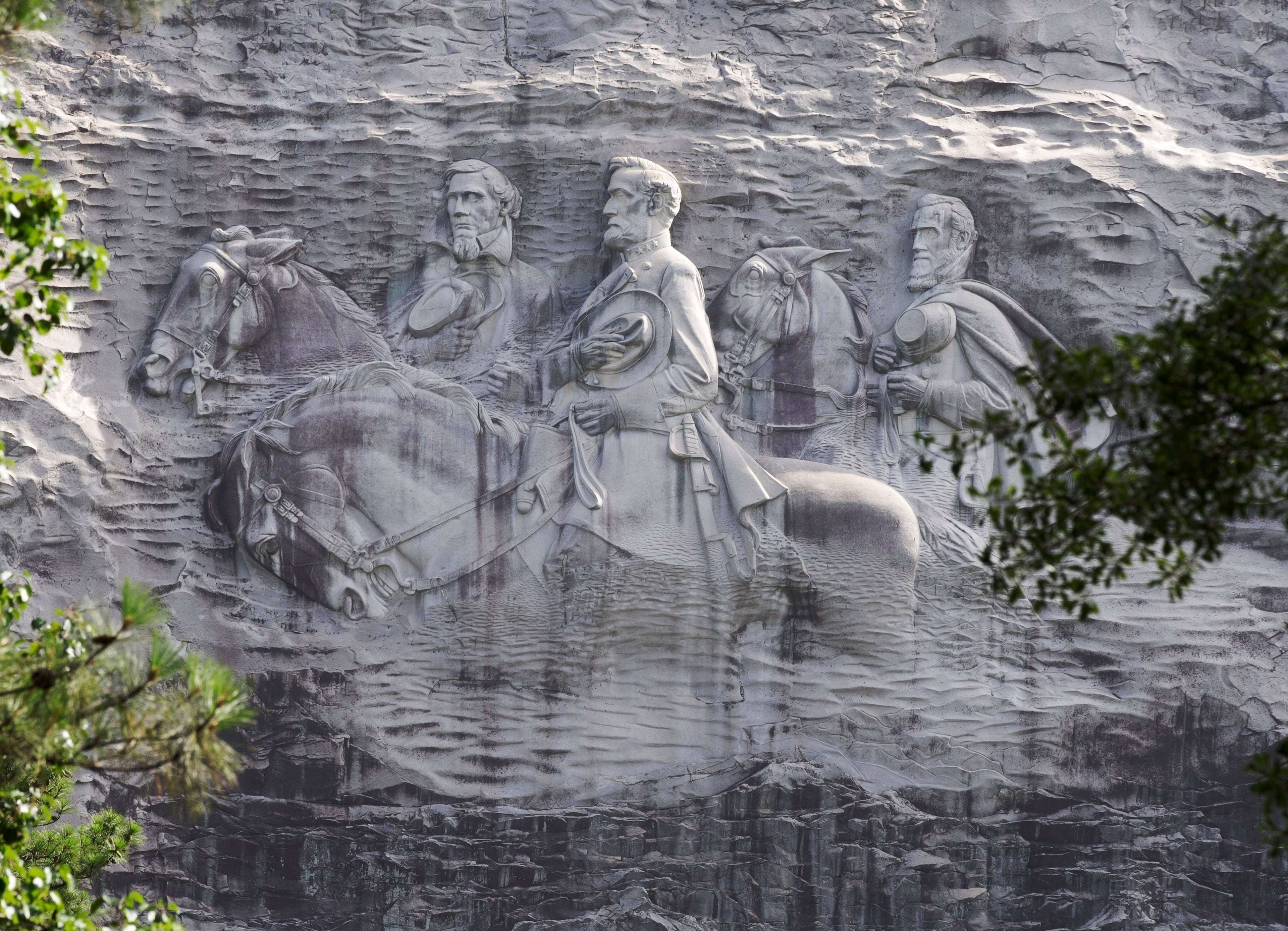 A carving depicting Confederate Civil War figures Stonewall Jackson, Robert E. Lee and Jefferson Davis, in Stone Mountain, Ga., photographed on June 23, 2015. (John Bazemore/AP)