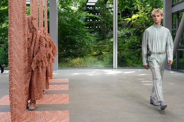 A model wears a creation part of the Issey Miyake men's Spring-Summer 2026 collection, that was presented in Paris Thursday, June 26, 2025. (AP Photo/Michel Euler)