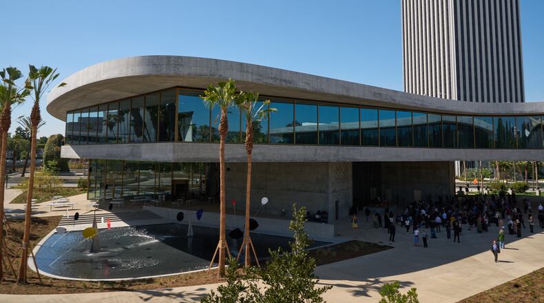 People attend the inaugural ceremony for the David Geffen Galleries at the Los Angeles County Museum of Art on Wednesday, April 15, 2026. (AP Photo/Damian Dovarganes)