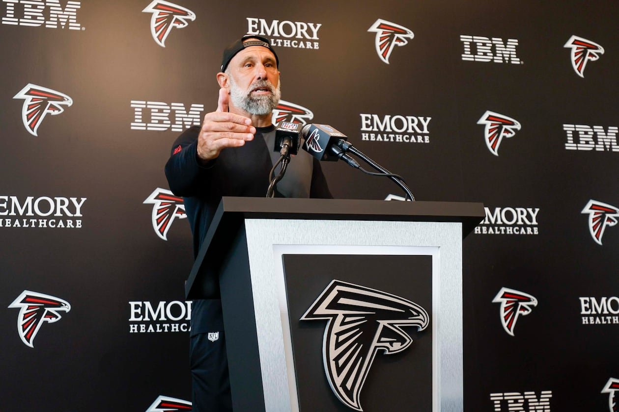 Defensive coordinator Jeff Ulbrich addresses members of the media on Tuesday, Aug. 12, 2025, in Flowery Branch. “Being in the AFC East for four years, got very familiar with Drake, especially the last year,” Ulbrich says. (Miguel Martinez/AJC)