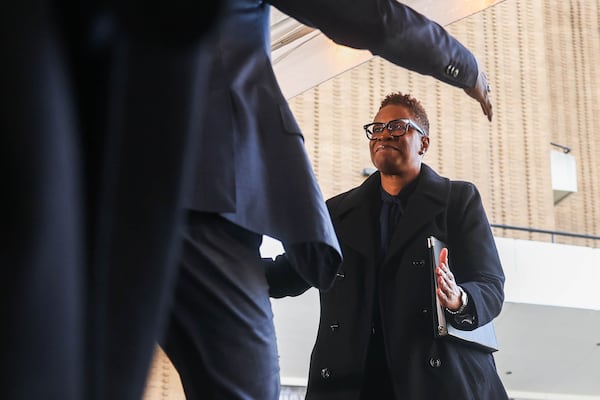 President & CEO at Atlanta Housing Terri M. Lee reaches to hug Mayor Andre Dickens during the groundbreaking of the Civic Center redevelopment. (Abbey Cutrer/AJC)