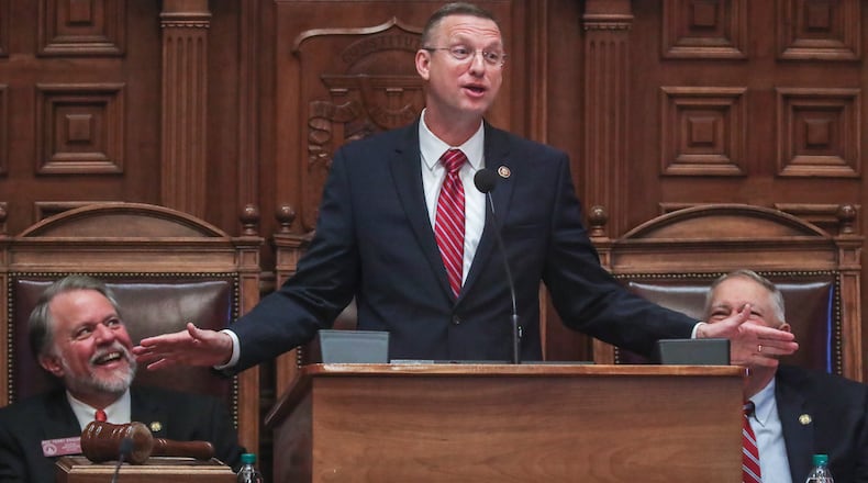 U.S. Rep. Doug Collins, center, in January addresses the Georgia House, where he served before entering Congress. House Speaker David Ralston, right, has formally endorsed Collins' bid for the U.S. Senate in a November special election. JOHN SPINK/JSPINK@AJC.COM
