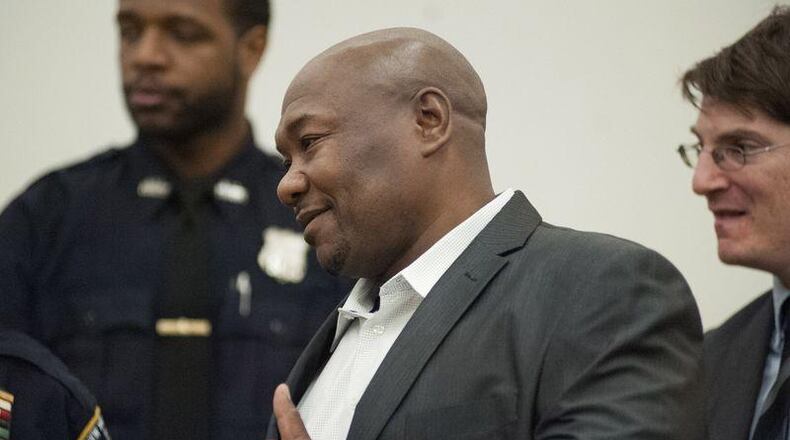Derrick Hamilton, who served 21 years of a life sentence for murder, smiles during a news conference after his conviction was vacated Jan. 9, 2015, at Brooklyn Supreme Court in New York.