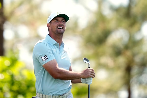 Bryson DeChambeau watches his tee shot on the fourth hole during the second round at the Masters golf tournament, Friday, April 11, 2025, in Augusta, Ga. (AP Photo/Julia Demaree Nikhinson)