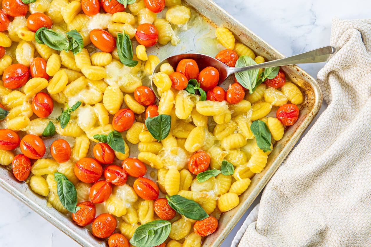 Sheet Pan Gnocchi with Tomatoes and Mozzarella. (Aaliyah Man for the AJC/Food styling by Kate Williams)