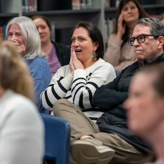 Parents attend an informational meeting about the Gwinnett County school system's decision to enforce redshirting rules, which would require students who are 5 by Sept. 1 to attend kindergarten instead of letting parents hold them back a year, at Simpson Elementary in Peachtree Corners on Wednesday, Jan. 21, 2026. (Olivia Bowdoin for the AJC)