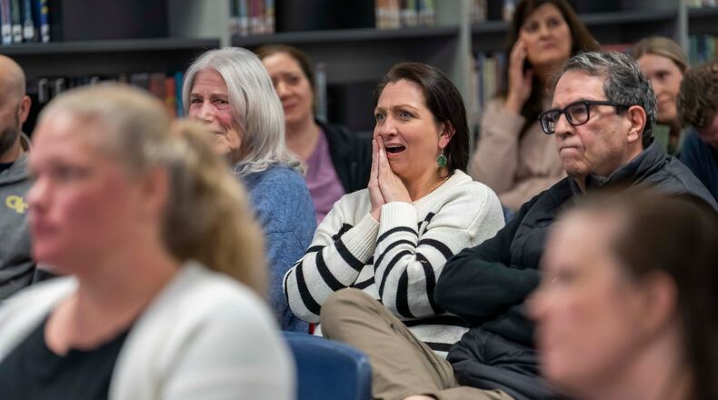 Parents attend an informational meeting about the Gwinnett County school system's decision to enforce redshirting rules, which would require students who are 5 by Sept. 1 to attend kindergarten instead of letting parents hold them back a year, at Simpson Elementary in Peachtree Corners on Wednesday, Jan. 21, 2026. (Olivia Bowdoin for the AJC)