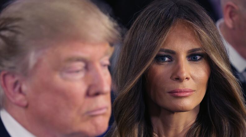 DETROIT, MI - MARCH 03: Republican presidential candidate Donald Trump and his wife Melania greet reporters in the spin room following a debate sponsored by Fox News at the Fox Theatre on March 3, 2016 in Detroit, Michigan. Voters in Michigan will go to the polls March 8 for the State's primary. (Photo by Chip Somodevilla/Getty Images)