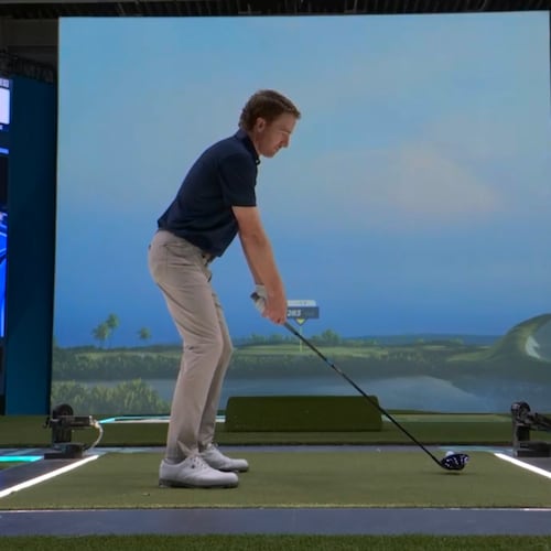 Roberto Castro tests out the simulator used by TGL Golf at the SoFi Center in Palm Beach Gardens, Fla. The Georgia Tech grad helped refine and shape the platform and has joined the broadcast team as an analyst. (Courtesy of TGL Golf)