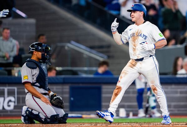 Toronto Blue Jays outfielder Alan Roden (18) celebrates his first career home run against the Atlanta Braves during fifth inning MLB baseball action in Toronto on Tuesday, April 15, 2025. (Thomas Skrlj/The Canadian Press via AP)