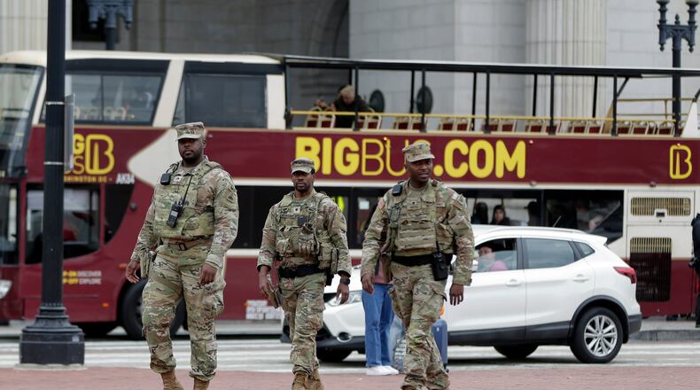 National Guard soldiers patrol at Union Station, Tuesday, Oct. 28, 2025, in Washington. (AP Photo/Rahmat Gul)