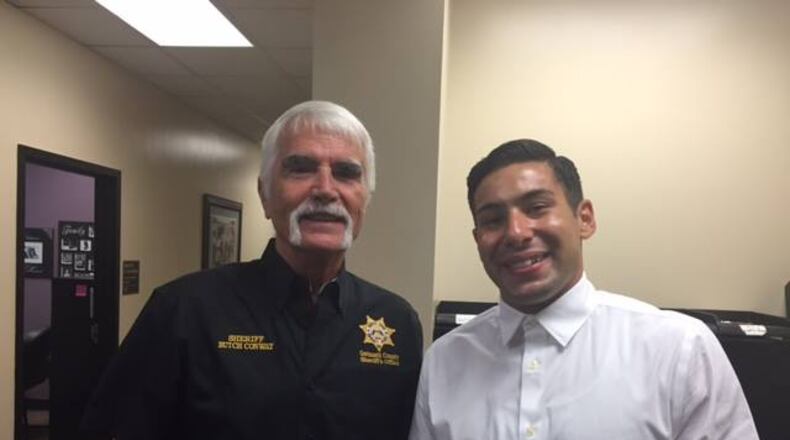 Former Gwinnett County inmate Simon Fine and Sheriff Butch Conway. (Facebook photo)