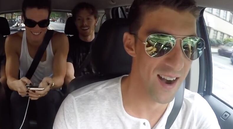 Michael Phelps in the driver's seat during the US Swim Team's Atlanta car karaoke session.