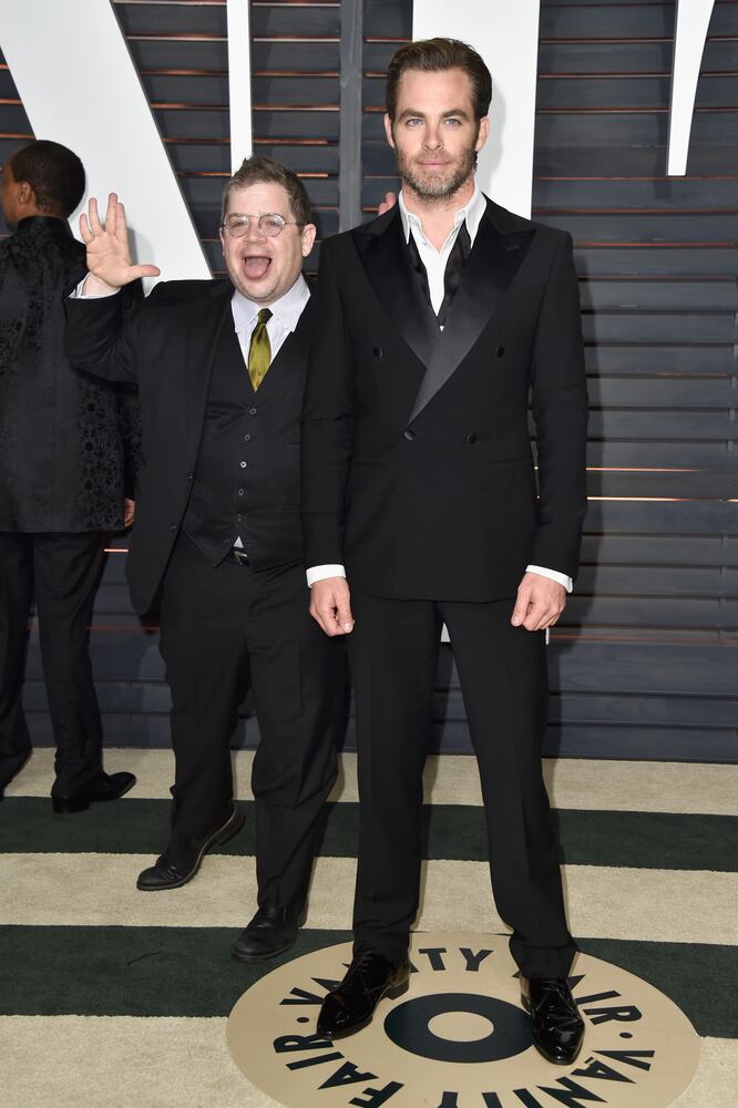 Actor Patton Oswalt (L) photobombs actor Chris Pine