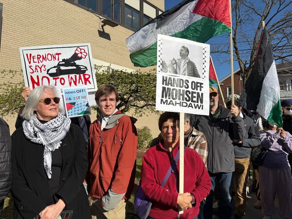Protesters gather outside federal court ahead of a hearing for Mohsen Mahdawi, a Palestinian man arrested at a Vermont immigration office during an interview about finalizing his U.S. citizenship and a legal permanent resident who led protests against the war in Gaza at Columbia University, Wednesday, April 23, 2025 in Burlington, Vt. (AP Photo/Amanda Swinhart)