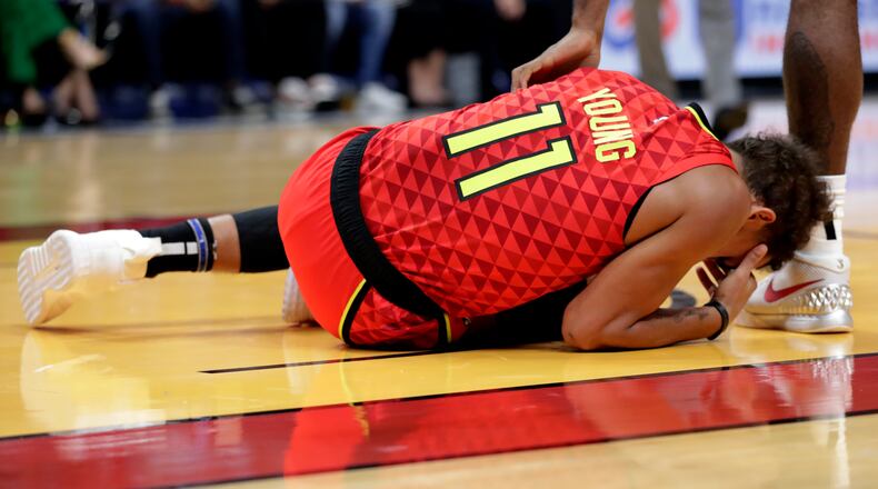 Each time the Hawks Trae Young goes down is a painful experience for all. (AP Photo/Lynne Sladky)