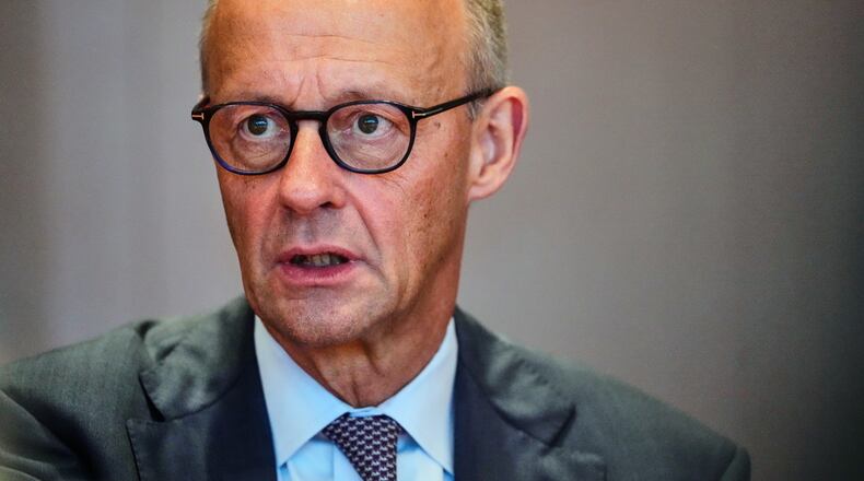 German Chancellor Friedrich Merz arrives for the Cabinet meeting at the Chancellery in Berlin, Germany, Wednesday, Sept. 16, 2026. (AP Photo/Markus Schreiber)