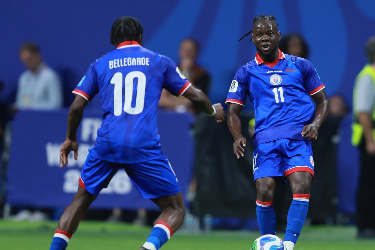 Haiti's Louicius Deedson, right, passes to teammate Jean-Ricner Bellegarde during second half of Morocco vs. Haiti Group C FIFA World Cup match at Atlanta Stadium (Mercedes-Benz Stadium) on Wednesday, June 24, 2026. (Jason Getz/AJC)