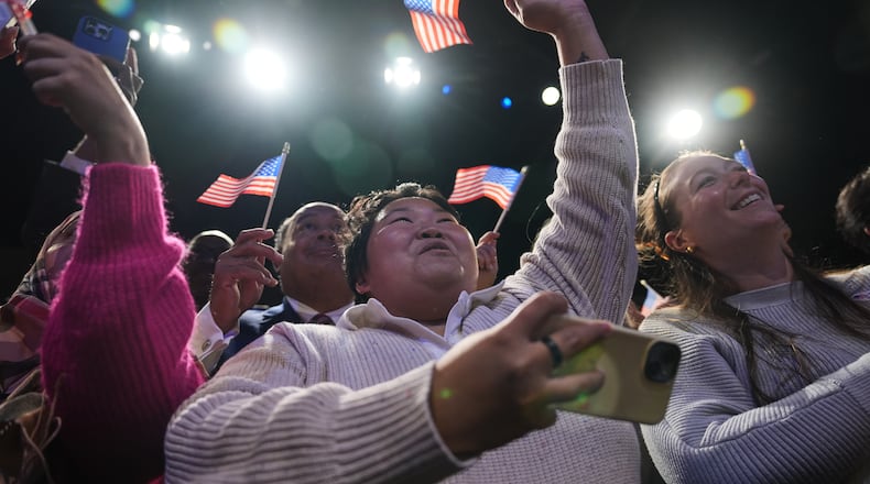 People cheer as Democrat Abigail Spanberger walks out on stage after she was declared the winner of the Virginia governor's race during an election night watch party Tuesday, Nov. 4, 2025, in Richmond, Va. (AP Photo/Stephanie Scarbrough)