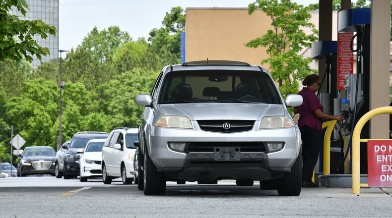 Customers wait their turn to fill up at an Atlanta Sam's Club on Clairmont road on Tuesday, May 11, 2021. Despite reports of gasoline shortages scattered throughout the Southeast on Tuesday morning because of a cybertattack involving Colonial Pipeline, industry analysts and experts are warning against panic buying and hoarding of gasoline. (Hyosub Shin / Hyosub.Shin@ajc.com)