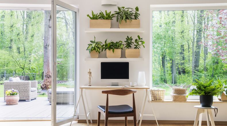Working from home can be as easy as pulling a console table and chair into a room. (Dreamstime/TNS)