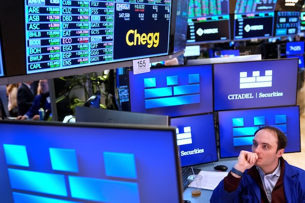 Joseph Maguire works on the floor at the New York Stock Exchange in New York, Tuesday, April 8, 2025. (AP Photo/Seth Wenig)