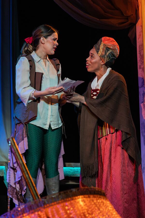 Erika Miranda (left) as assassin Charlotte Corday and Tiffany Denise Hobbs as Marianne Angelle, a composite of historic Black Caribbean revolutionary abolitionist women. (Courtesy of Theatrical Outfit/Casey Gardner Ford)
