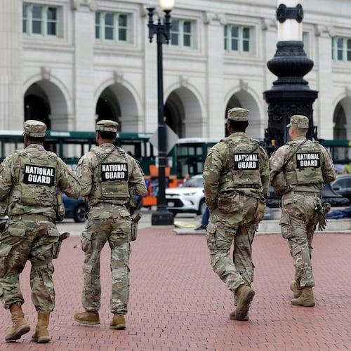 National Guard soldiers patrol at Union Station, Tuesday, Oct. 28, 2025, in Washington. (AP Photo/Rahmat Gul)