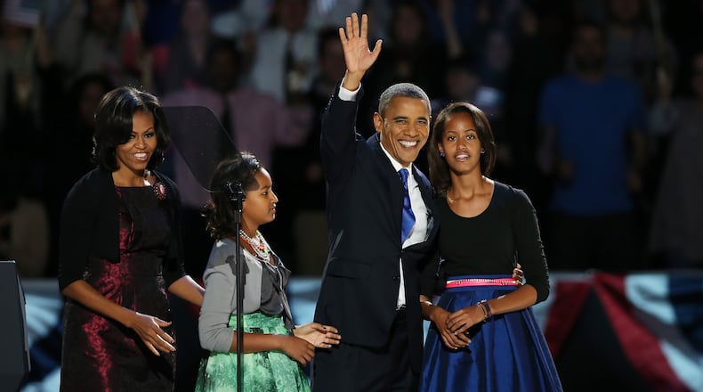 The election of Barack Obama as the first African-American president signaled both pride and hope for many in the black community. In many ways the Obamas softened the lens on black families that have long been thought of as dysfunctional. (Photo by Scott Olson/Getty Images)