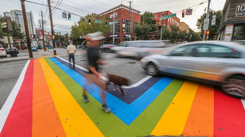 A petition is asking that the crosswalks at 10th Street and Piedmont Avenue in Midtown be painted in the colors of the rainbow or transgender flags. In 2015, during the Atlanta Pride event, the crosswalks bore the colors of the rainbow flag, a commonly accepted symbol of pride for the gay community. JOHN SPINK /JSPINK@AJC.COM