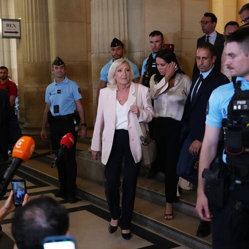 Far-right leader Marine Le Pen leaves the courtroom after the verdict of her appeal trial, in Paris, France, Tuesday, July. 7, 2026. (AP Photo/Aurelien Morissard)