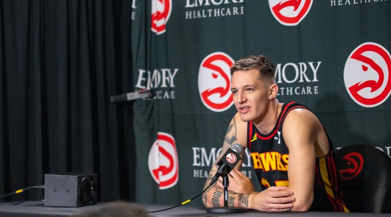 Hawks player Vit Krejci, #27, takes questions during media day. Hawks media day takes place on Monday, Sept 30, 2024 where media outlets including the Associated Press, Getty, NBA and many others gather to take photos, conduct interviews and gather footage.   (Jenni Girtman for The Atlanta Journal-Constitution)