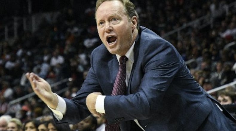Hawks coach Mike Budenholzer's team is giving up a lot of wide open 3s. (AP Photo)