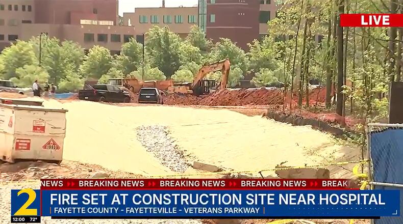 Construction equipment set on fire near hospital in Fayette County.