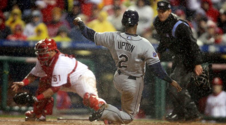 Tampa Bay Rays B.J. Upton scores on a Carlos Pena single to left center against the Philadelphia Phillies on Oct. 27, 2008. (Gary W. Green/Orlando Sentinel/TNS)