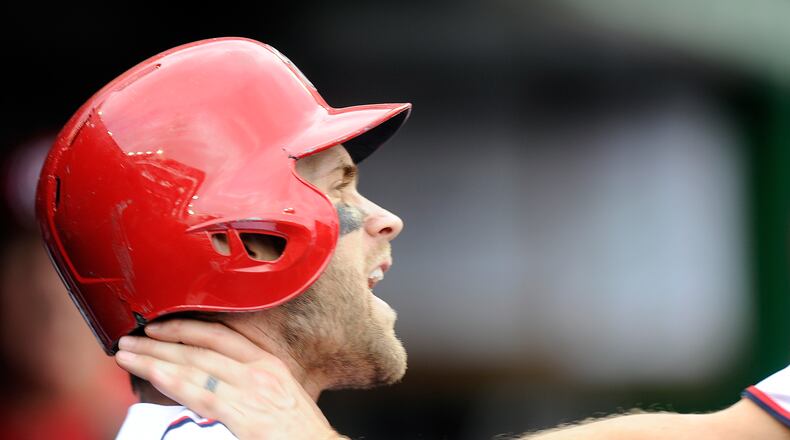 WASHINGTON, DC - SEPTEMBER 27: Bryce Harper #34 of the Washington Nationals is grabbed by Jonathan Papelbon #58 in the eighth inning against the Philadelphia Phillies at Nationals Park on September 27, 2015 in Washington, DC. (Photo by Greg Fiume/Getty Images)