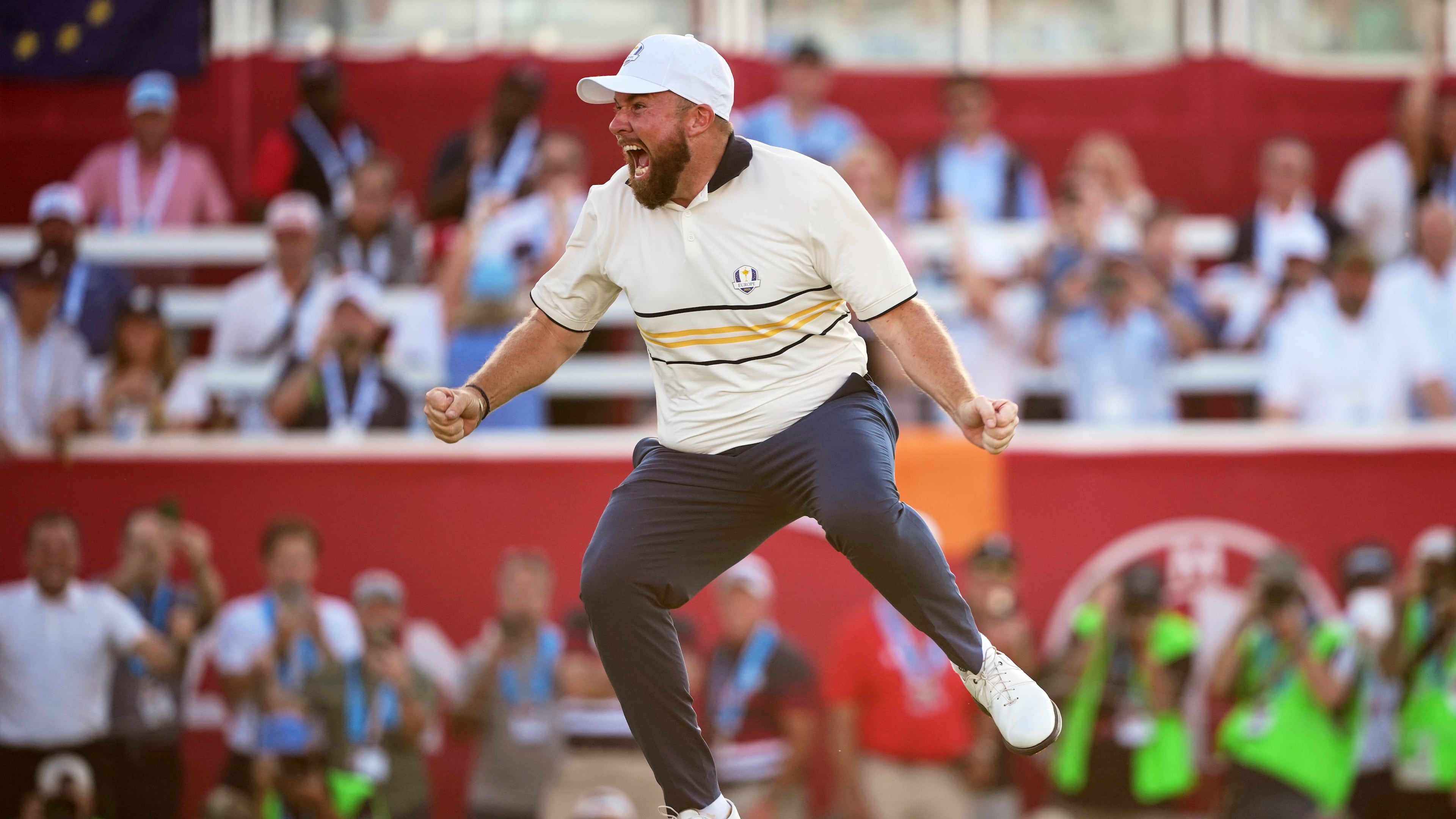 Europe's Shane Lowry celebrates after making the winning putt putt on the 18th hole during their singles match on the Bethpage Black golf course at the Ryder Cup golf tournament, Sunday, Sept. 28, 2025, in Farmingdale, N.Y. (AP Photo/Matt Slocum)