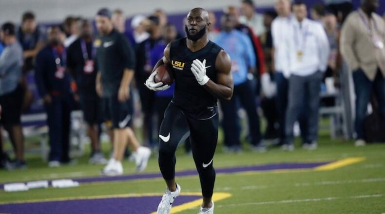 LSU running back Leonard Fournette runs through drills during their NCAA college football pro day in Baton Rouge, La., Wednesday, April 5, 2017. (AP Photo/Gerald Herbert)