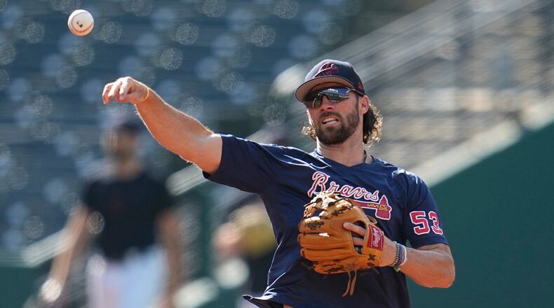 Atlanta Braves' Charlie Culberson warms up during batting practice before a baseball game against the Cleveland Guardians, Monday, July 3, 2023, in Cleveland. (AP Photo/Sue Ogrocki)