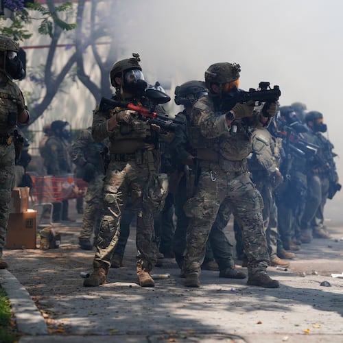 FILE - Law enforcement respond to protesters after federal immigration authorities conducted operations, June 7, 2025, in Paramount, Calif. (AP Photo/Eric Thayer, File)