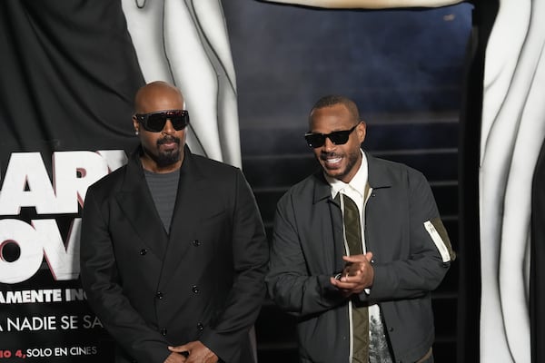 Actors Shawn Wayans (left) and Marlon Wayans attend a "Scary Movie" fan event in Mexico City in May. (Marco Ugarte/AP)