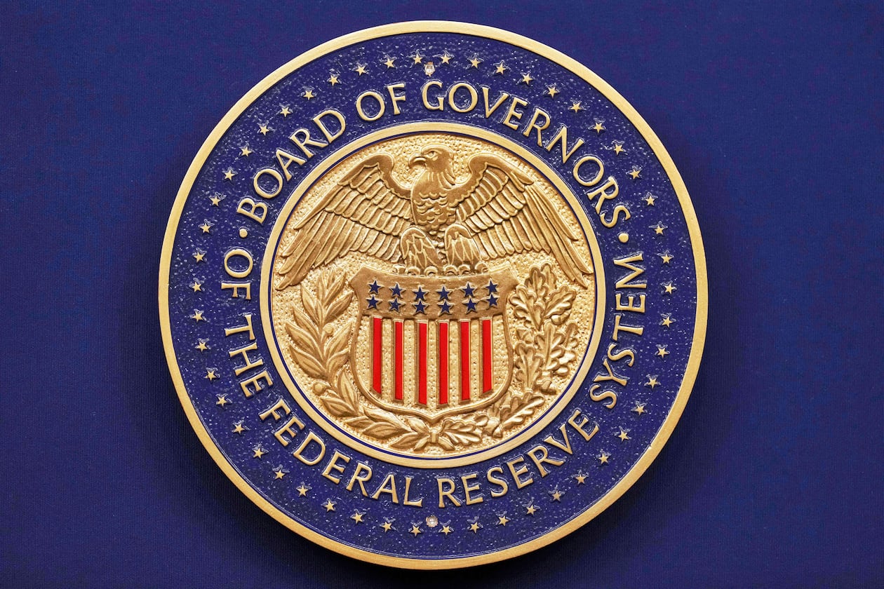 FILE - A seal is seen before Federal Reserve Chairman Jerome Powell walks out to speak during a news conference following the Federal Open Market Committee meeting, Sept. 17, 2025, at the Federal Reserve Board Building in Washington. (AP Photo/Jacquelyn Martin, File)