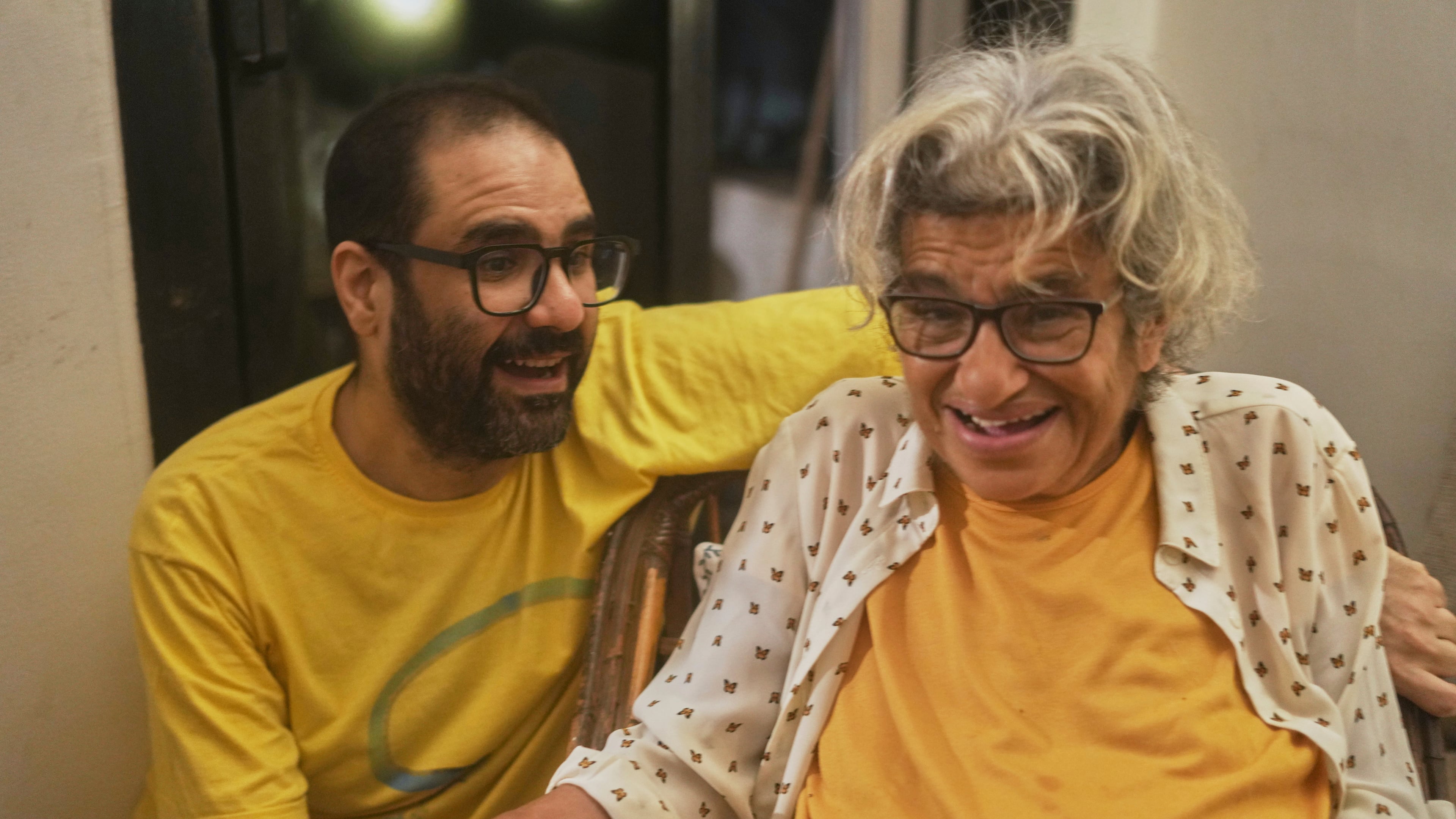 Pro-democracy activist Alaa Abd el-Fattah who was in prison for almost all of the past 12 years, hugs his mother Laila Soueif, as he arrives at his home, after a presidential pardon, in Cairo, Egypt, Tuesday, Sept. 23, 2025. (AP Photo/Amr Nabil)