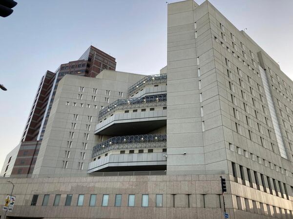 The exterior of the Metropolitan Detention Center in Los Angeles, on Sunday, May 2, 2021. (AP Photo/Damian Dovarganes)